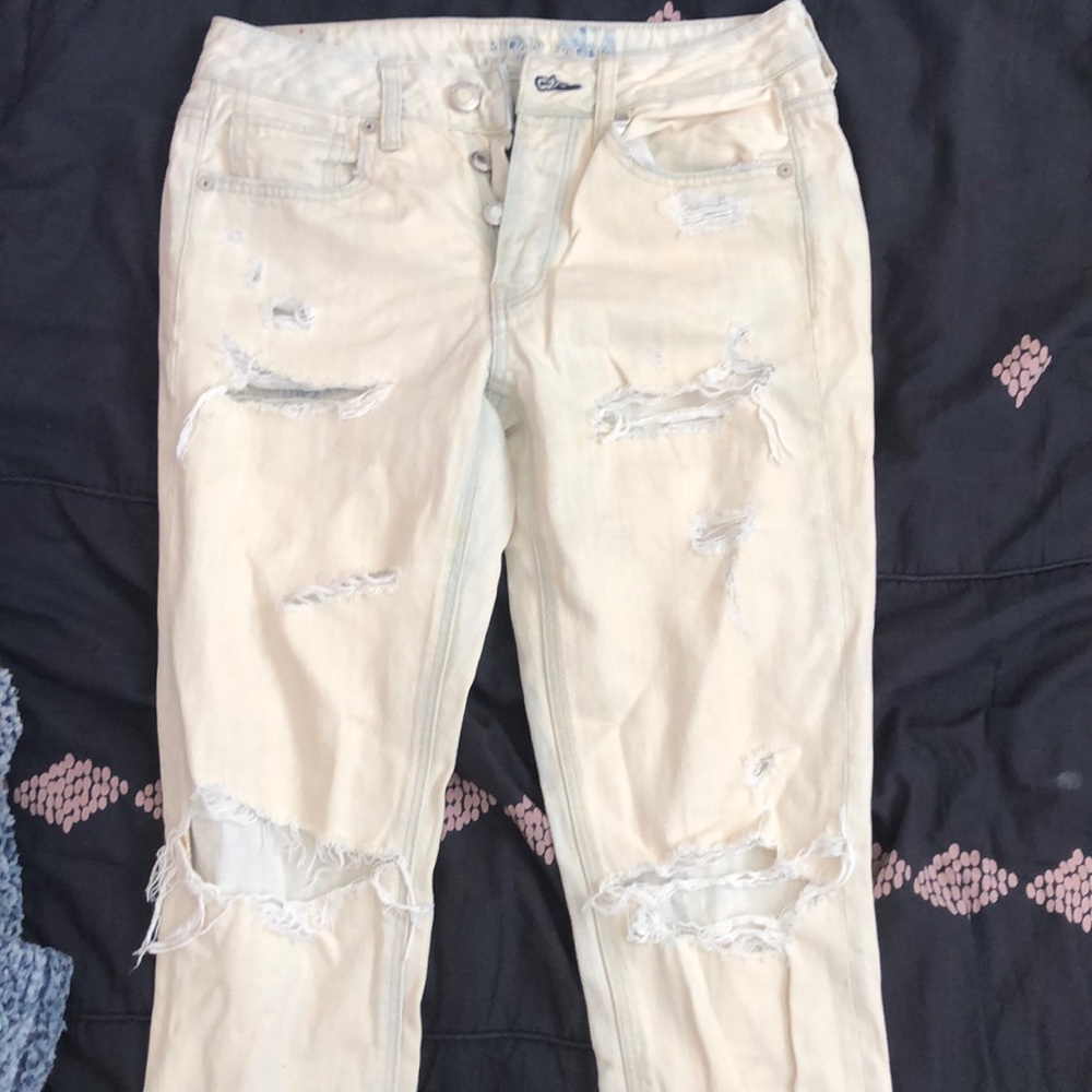 Ripped acid washed skinny jeans